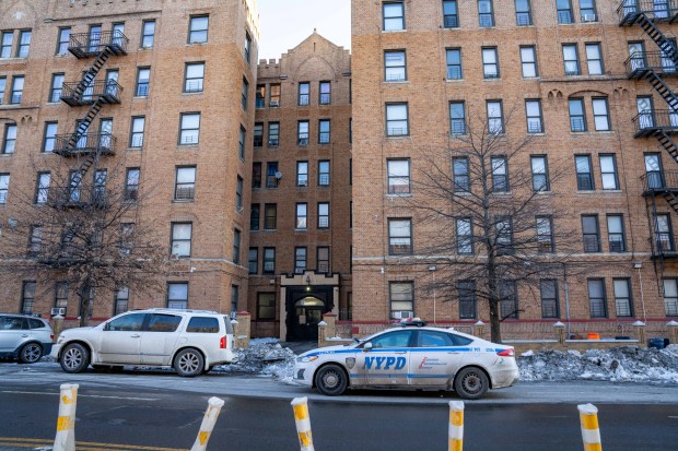 NYPD officers are pictured the morning after after Kenneth Brewer was stabbed to death inside an apartment building on Rockaway Parkway near Winthrop St. in East Flatbush, Brooklyn, Wednesday, Feb. 4, 2026. (Theodore Parisienne / New York Daily News)