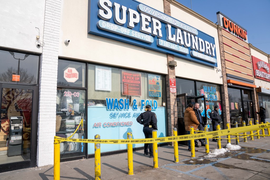 Man, 31, clinging to life after he's shot in head outside Queens laundromat