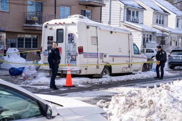A man and a dog were pronounced dead on scene after they were found unconscious and unresponsive inside a mobile veterinary van parked on 65th Ave. in Queens on Sunday, Feb. 1, 2026. (Theodore Parisienne / New York Daily News)