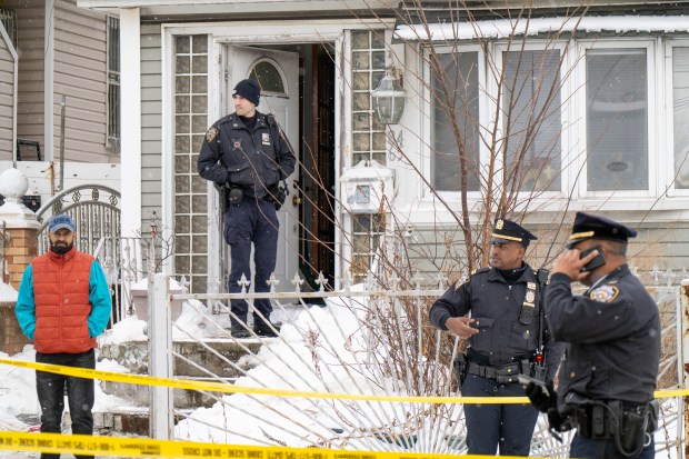 Police are pictured after NYPD officers shot a man who allegedly advanced on them while refusing to drop a knife inside a home on Parsons Blvd. in Queens on Monday, Jan. 26, 2026. (Theodore Parisienne / New York Daily News)