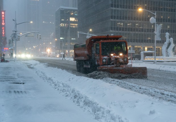 A snow plow clears Sixth Ave. in Manhattan during a blizzard Monday, Feb. 23, 2026, in New York City. (Barry Williams/ New York Daily News)