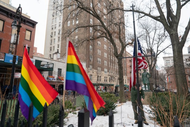 A National Park Service employee raises the U.S. Flag at the Stonewall National Monument Wednesday, Feb. 11, 2026 in Manhattan, New York.
