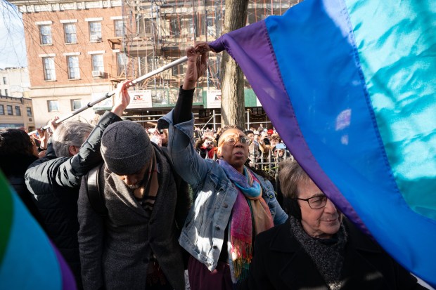 Leaders carry a pride flag to be raised at the Stonewall National Monument Thursday, Feb. 11, 2026 in Manhattan, New York. (Barry Williams/ New York Daily News)