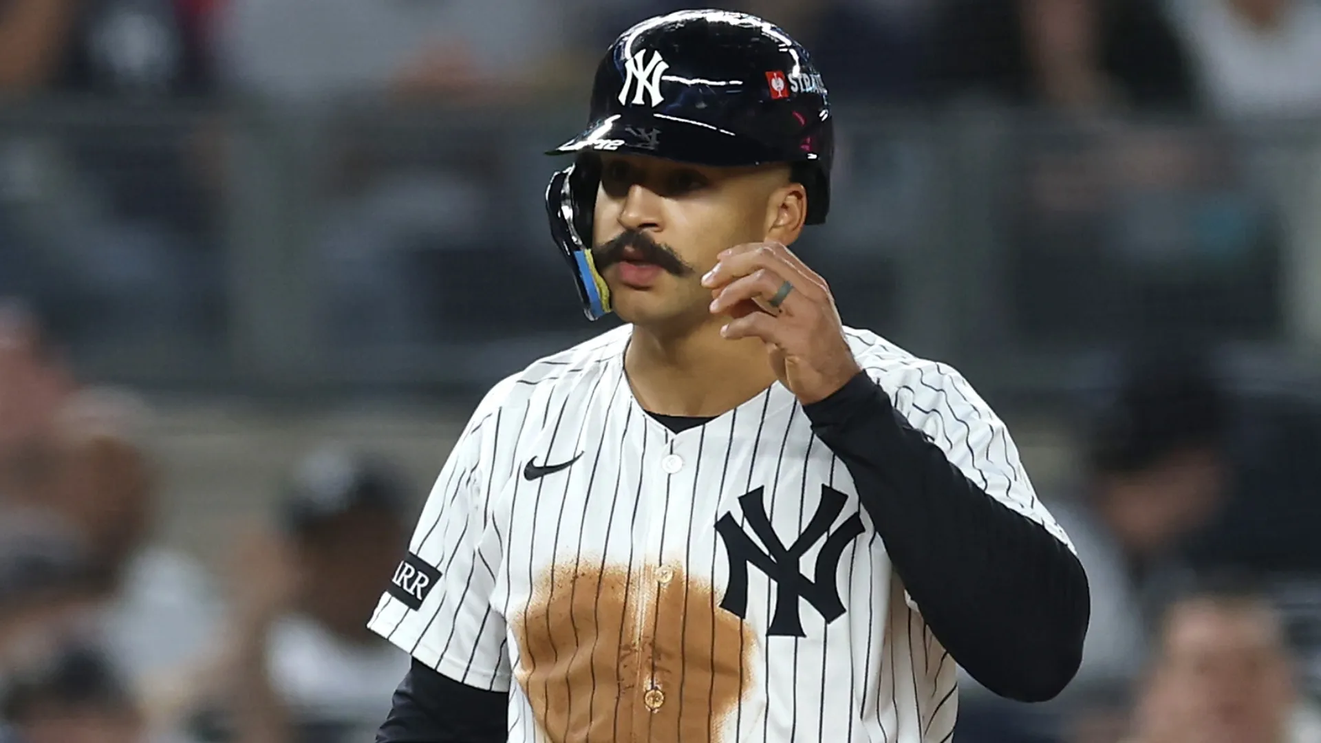Trent Grisham #12 of the Yankees looks on after stealing third base. Ishika Samant/Getty Images