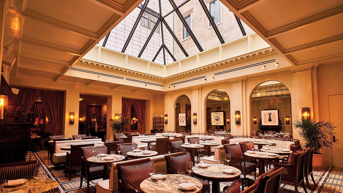 A Manhattan Boutique Hotel's Restored Facade and Lacelike Gable Complement a Historic District