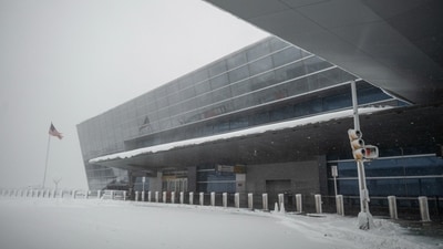 The storm, described as a bomb cyclone, has caused severe travel disruptions and power outages across the Northeast, with authorities warning of continued challenges ahead. (Bloomberg)