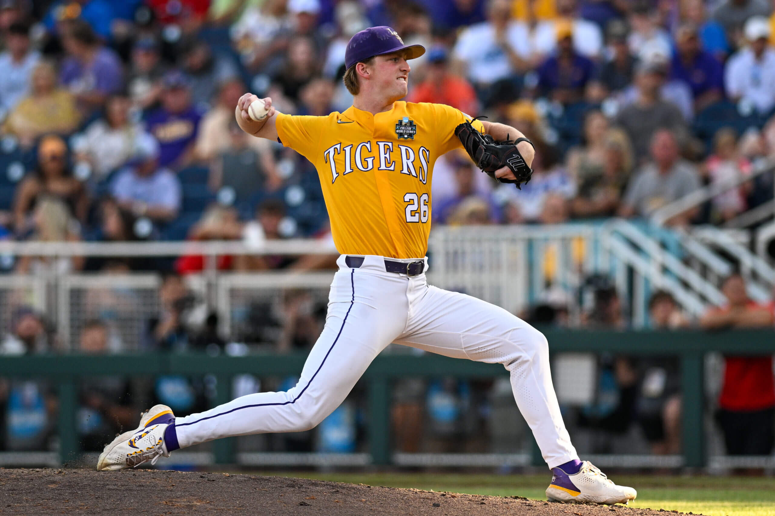 LSU Tigers pitcher Thatcher Hurd (26) throws against the Florida Gators in the third inning at Charles Schwab Field Omaha. 