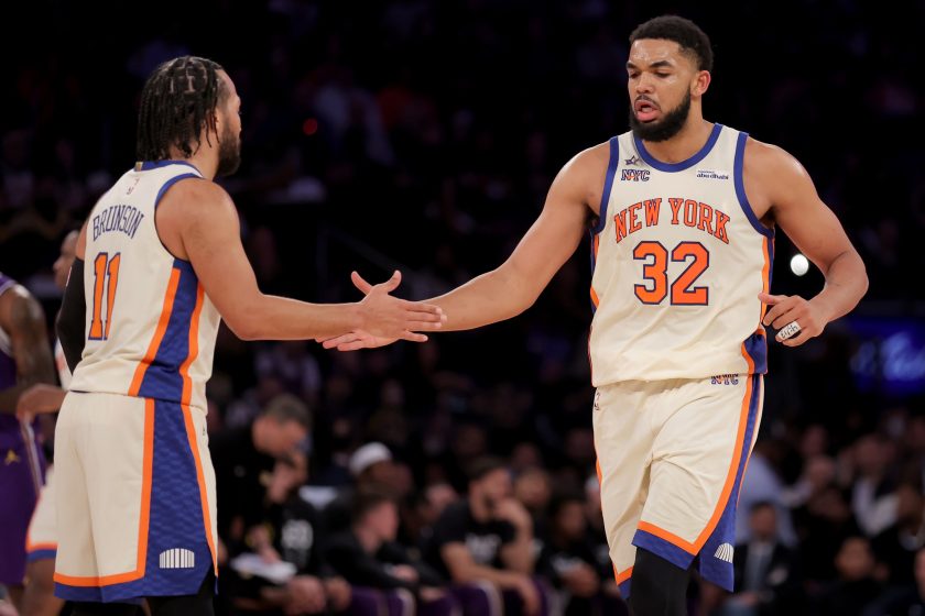 Feb 1, 2026; New York, New York, USA; New York Knicks center Karl-Anthony Towns (32) high fives guard Jalen Brunson (11) during the third quarter against the Los Angeles Lakers at Madison Square Garden.