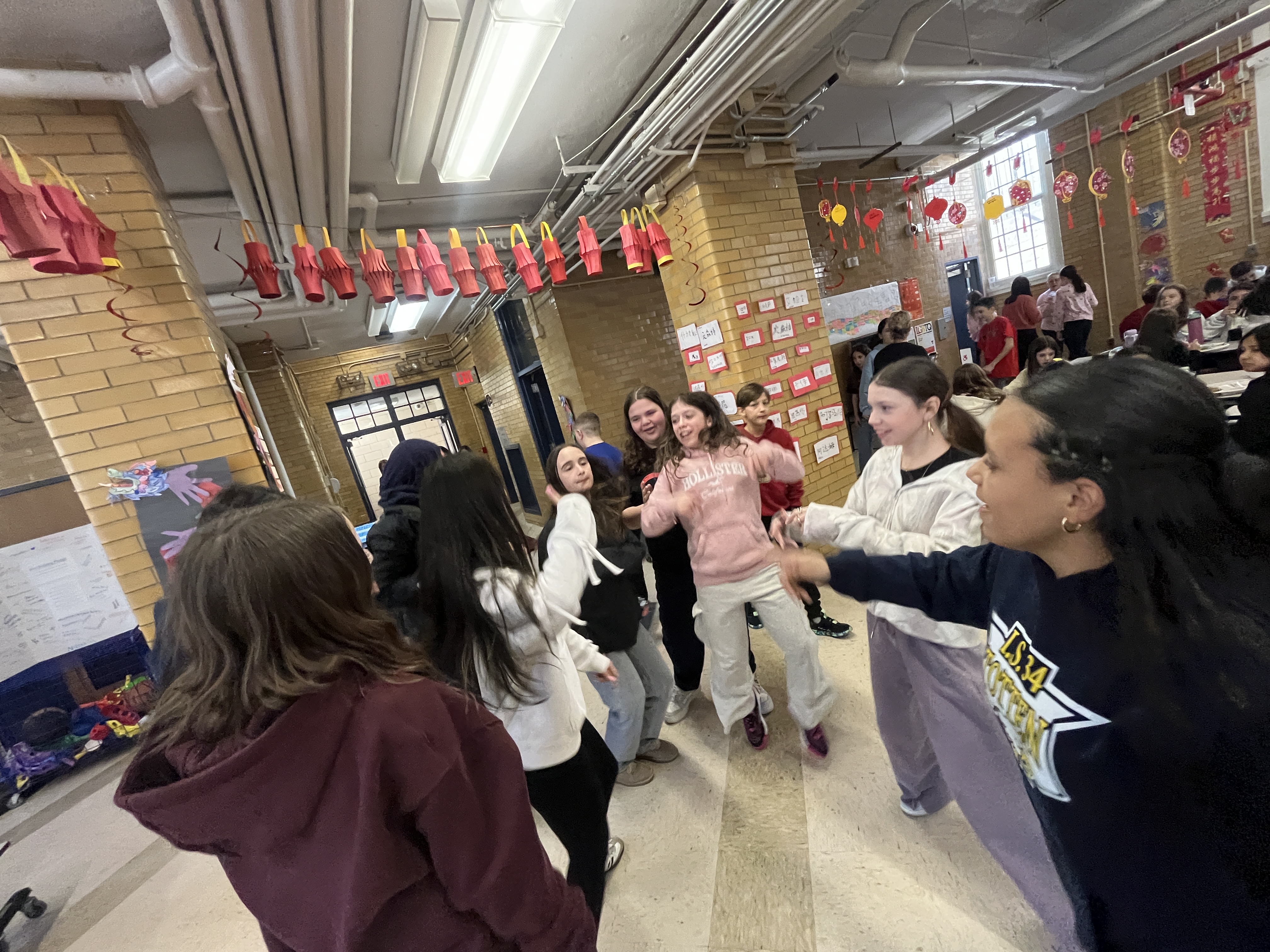 Millions of schools across the United States, including some on Staten Island, like I.S. 34 in Tottenville, took part in National No One Eats Alone Day. The lunchtime program, created by the nonprofit Beyond Differences, aims to make cafeterias more welcoming by encouraging students to connect with classmates they might not usually sit with. Today's lunch also featured dancing. (Advance/SILive.com | Jan Somma-Hammel)