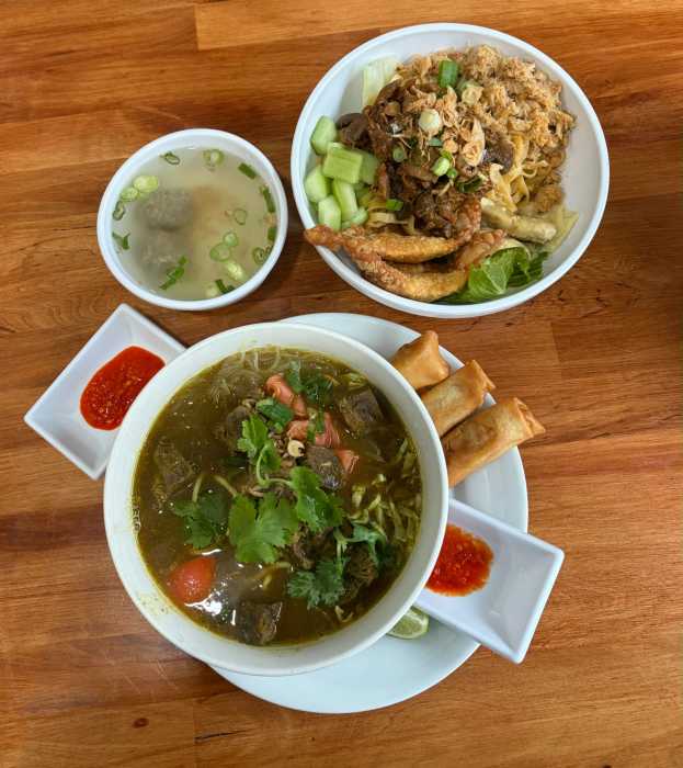 Dishes offered by Asian Taste 86 to victims of the recent Dongan Avenue fire. Photo via Queens Together. 