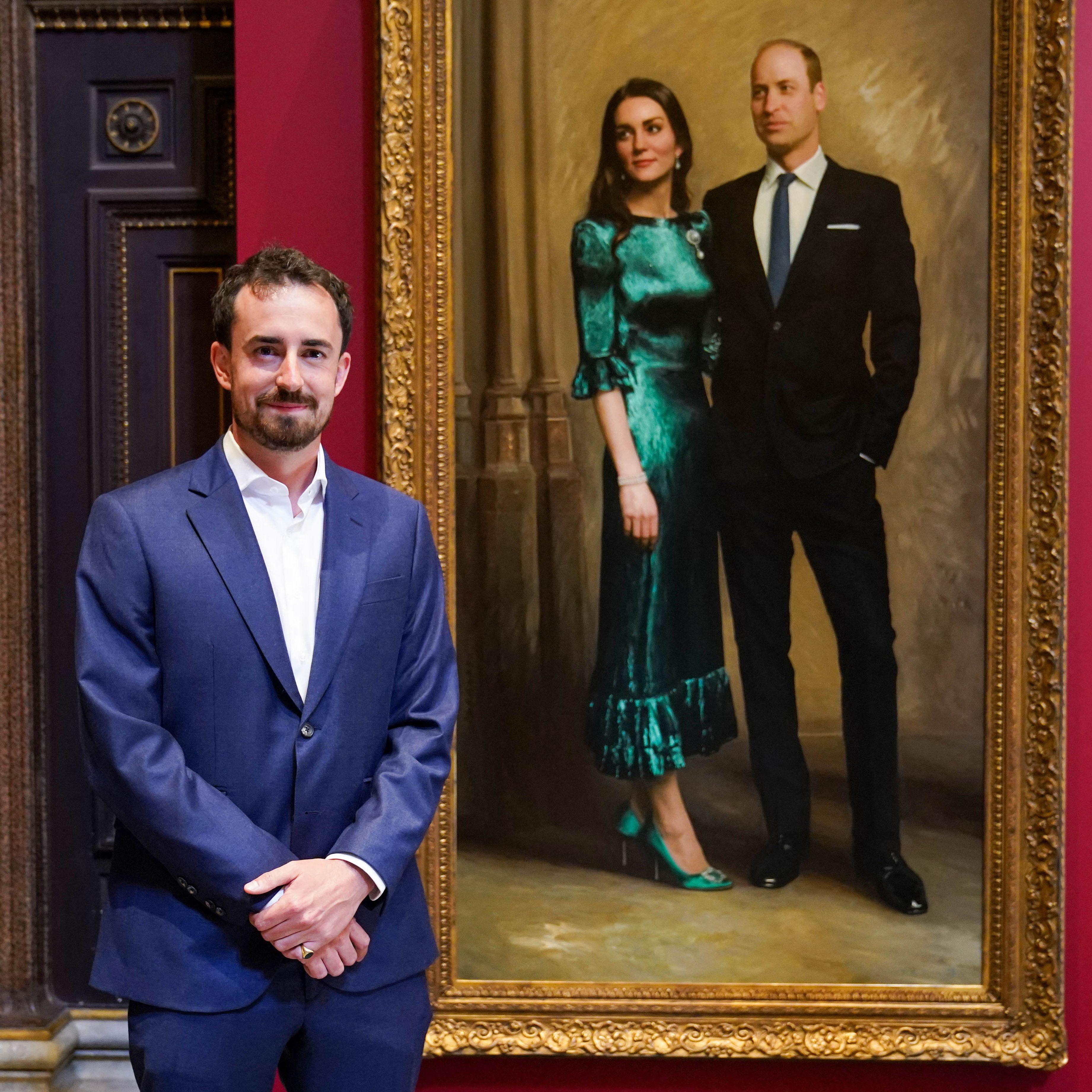 Artist Jamie Coreth poses with his painting of Prince William and Princess Kate