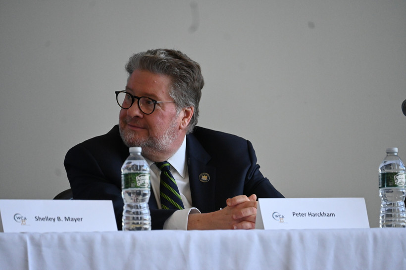 State Sen. Peter Harckham at a table