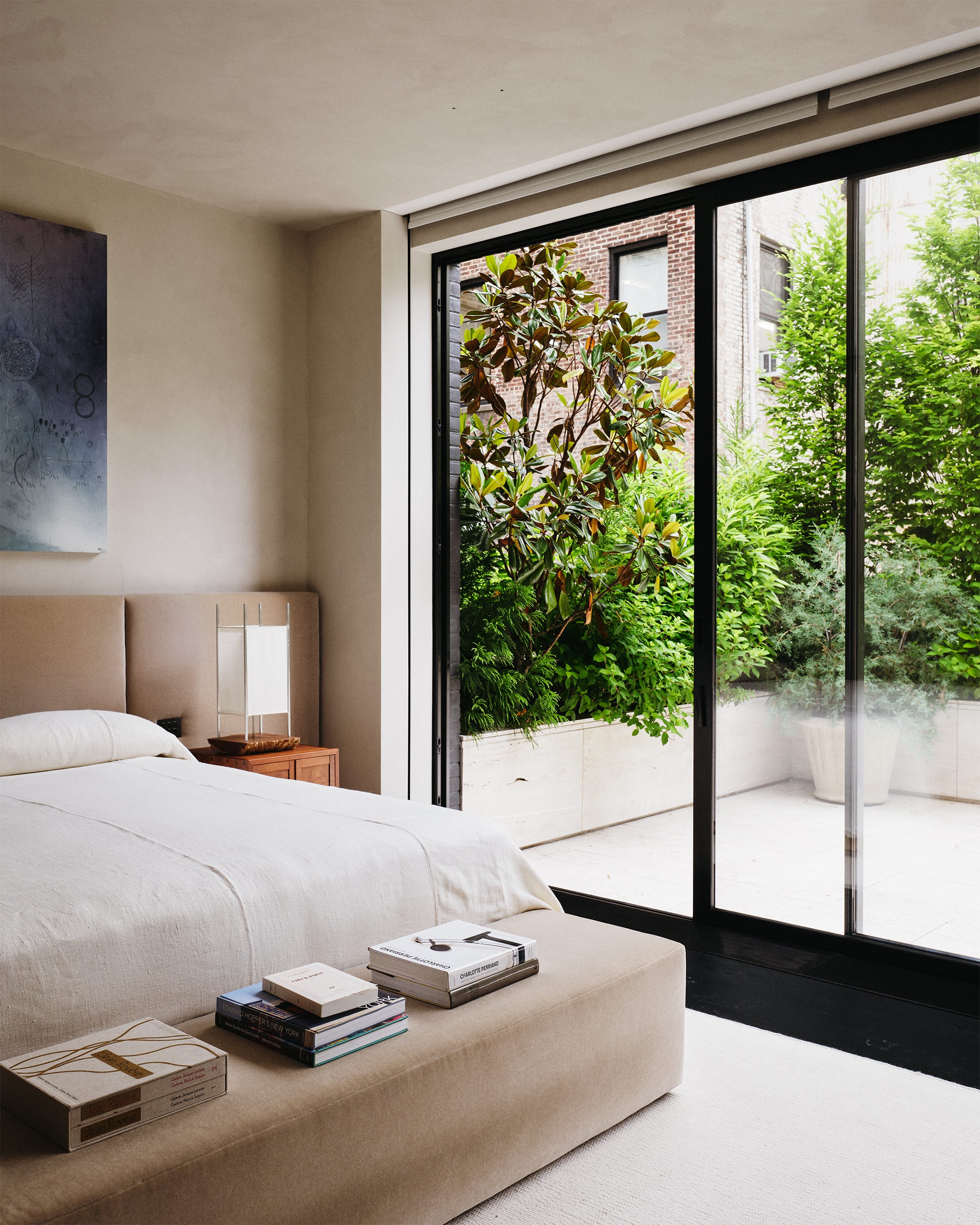 Modern bedroom with garden view.