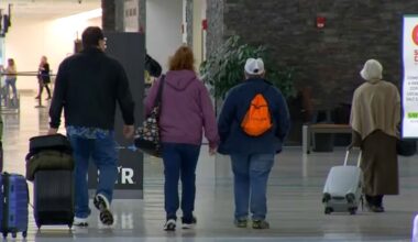 People walking in an airport terminal