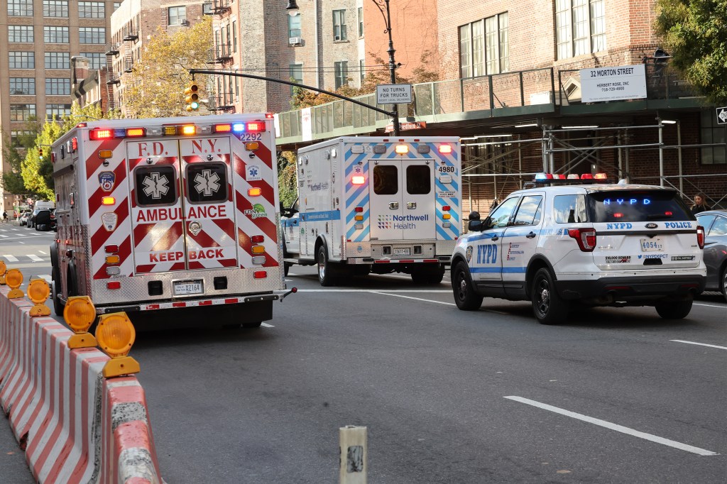 Ambulances and NYPD 6th pct police leaving Morton Street and 7th Avenue South. after a van struck a pedestrian. 