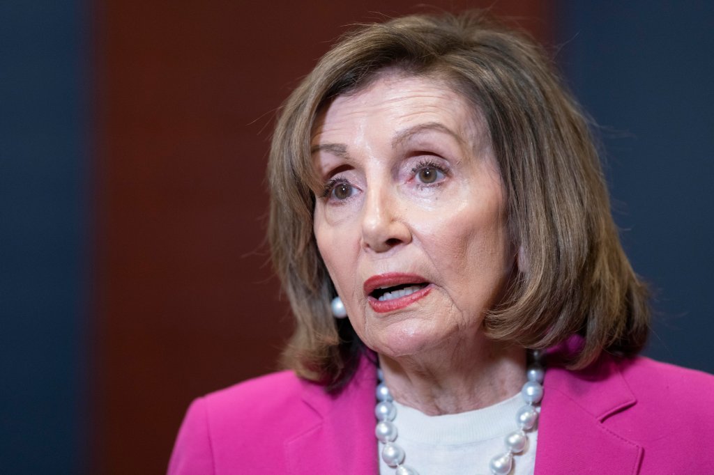 Former Speaker Nancy Pelosi speaking to reporters.