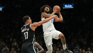 Mavericks beat Nets 123-114 after both teams arrive on game day because of blizzard