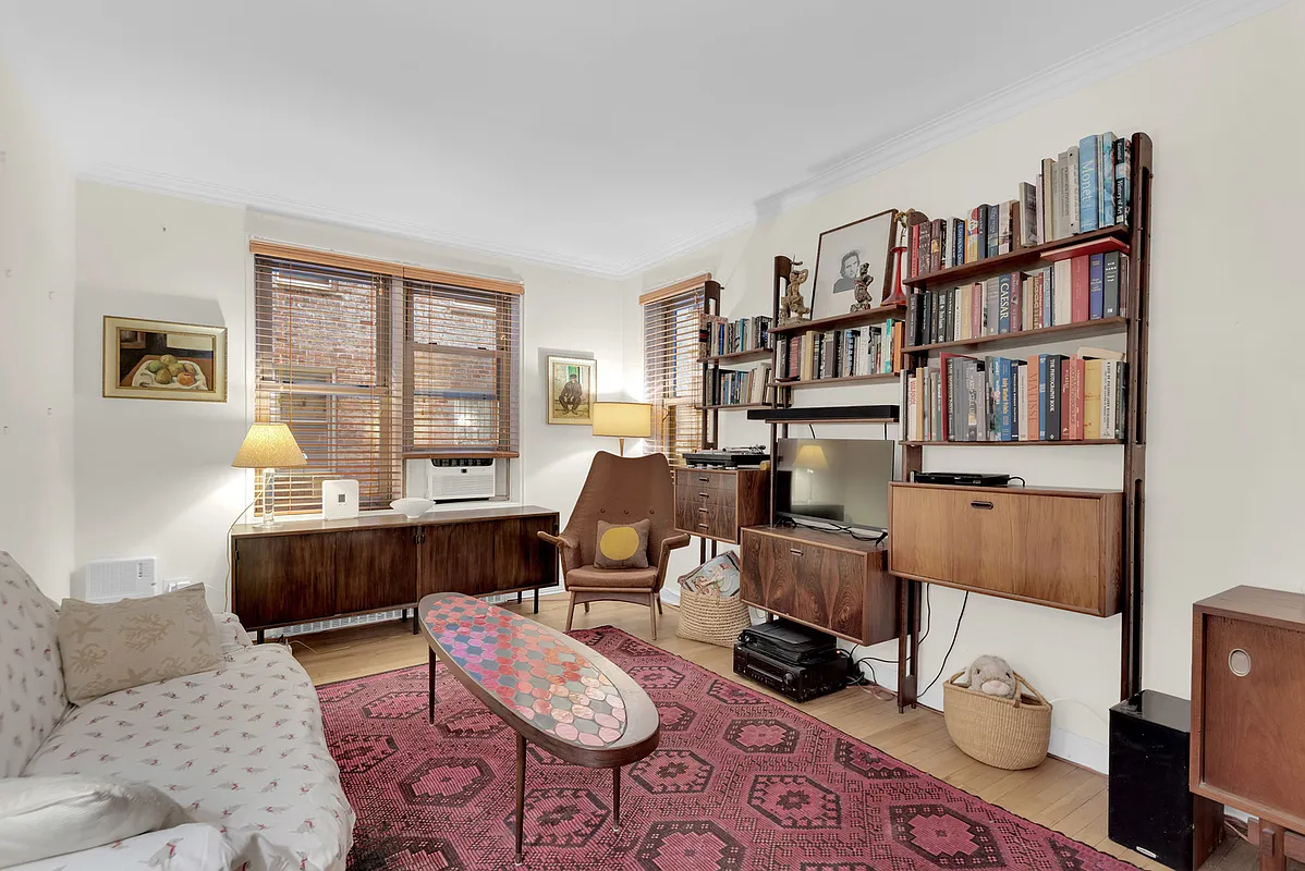 living room with wood floor, two windows