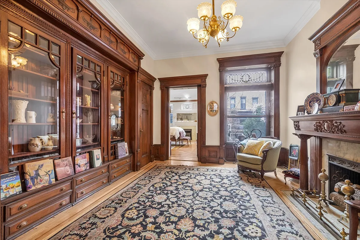 rear parlor with built-ins, mantel