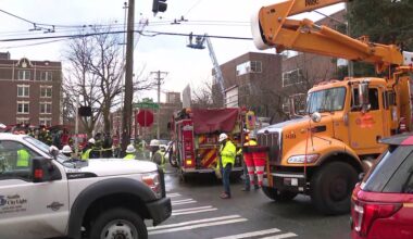 Operator rescued after crane crashes into power pole in Queen Anne