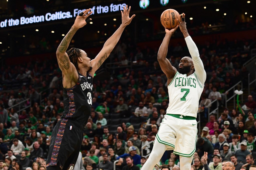 Boston Celtics guard Jaylen Brown (7) shooting the ball over Brooklyn Nets center Nic Claxton (33).