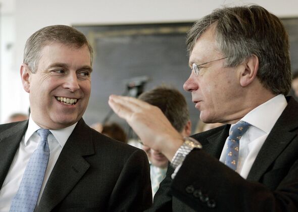 Britain's Prince Andrew speaks with Brit...