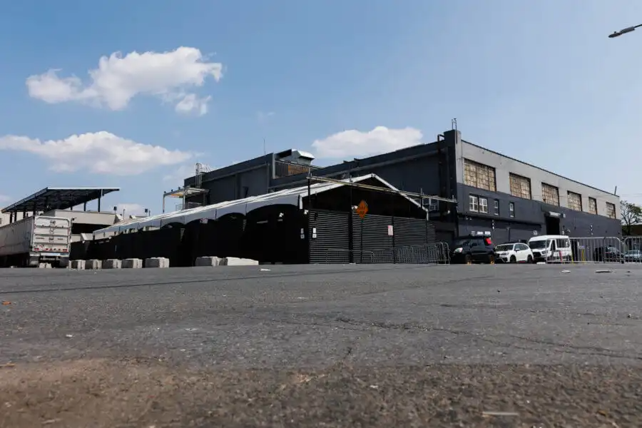 an event tent outside a two story building
