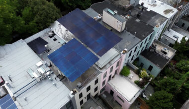 solar panel installation on roof, drone-view