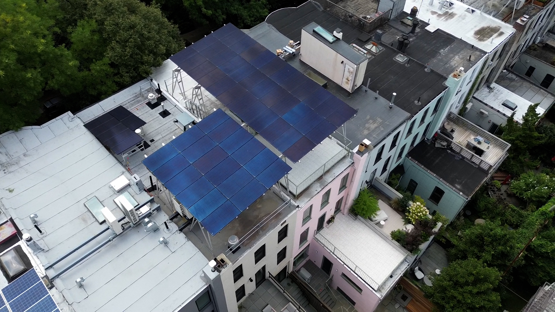 solar panel installation on roof, drone-view