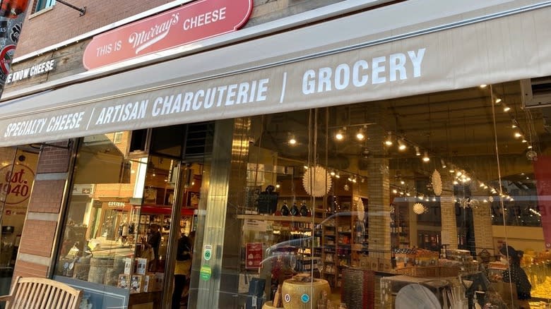 The exterior of Murray's Cheese, showing signage and windows