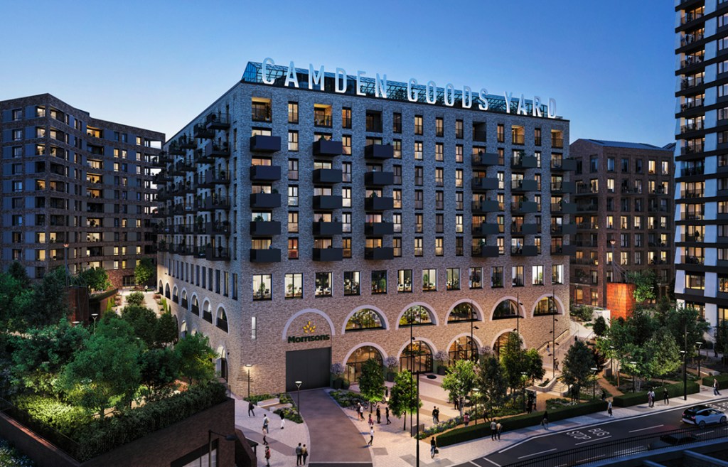 Illustration of the Camden Goods Yard development at dusk.