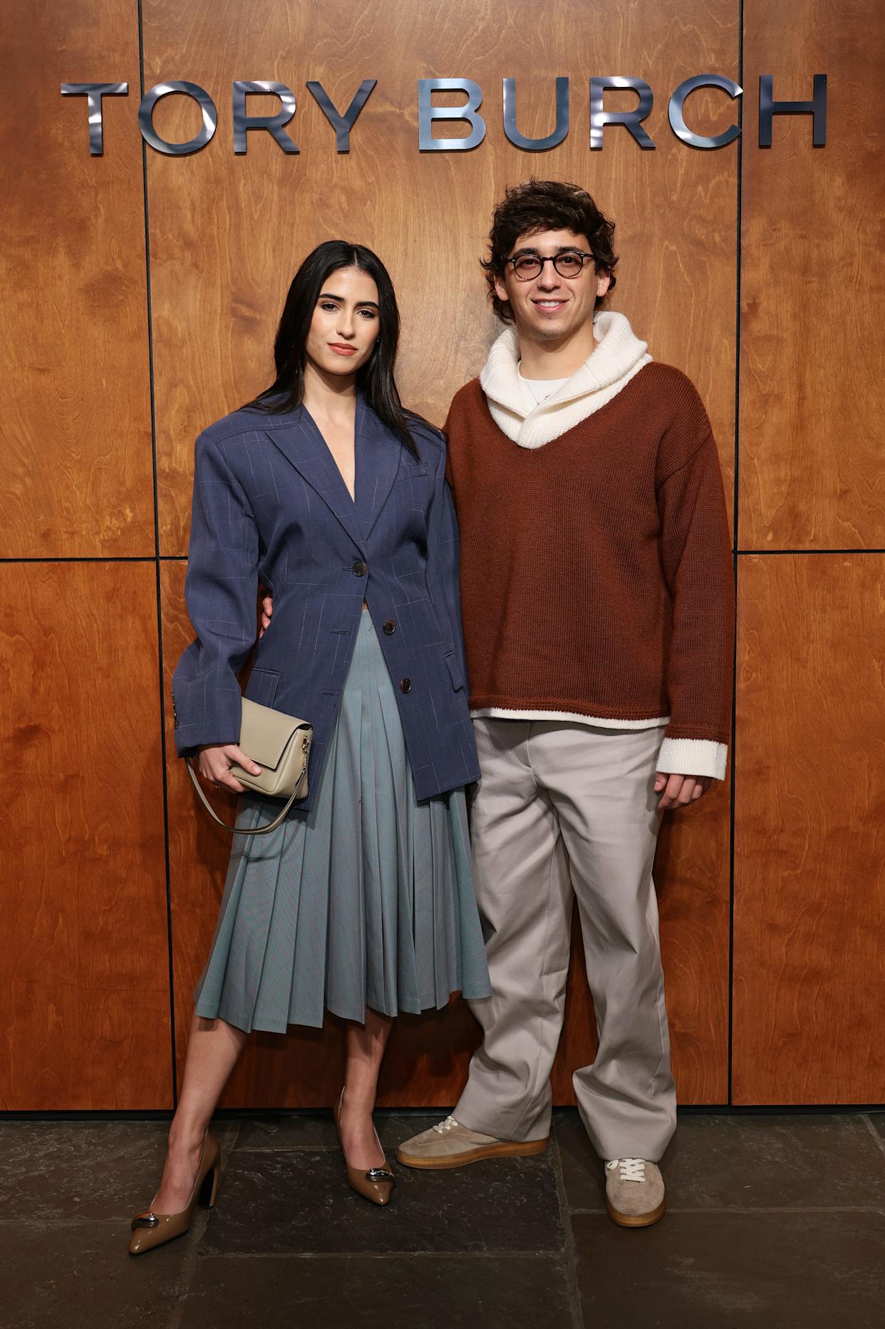 Ana Amelia Batlle Cabral and Marcello Hernández at the Tory Burch fall/winter runway show during New York Fashion Week.