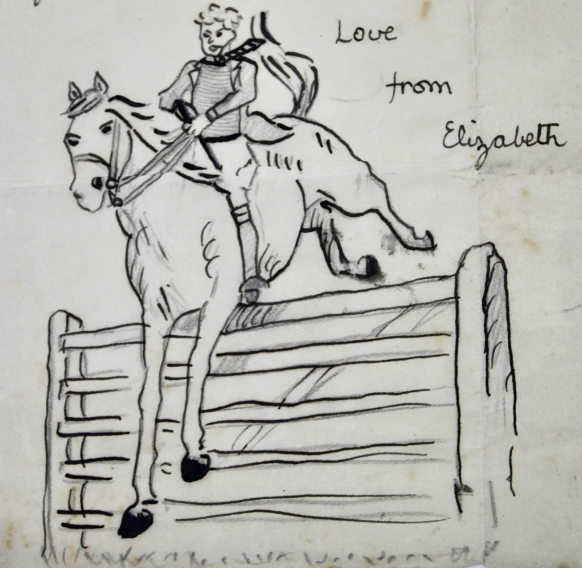 A sketch of a child jumping a fence on a horse that says Love From Elizabeth