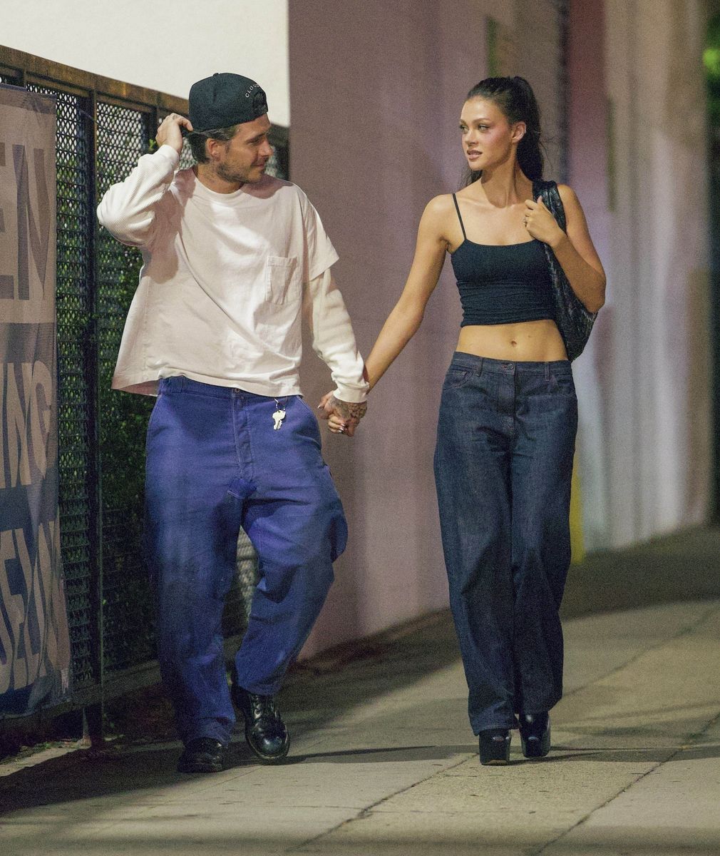 Nicola accessorized the look with her dazzling engagement ring, proving that their relationship is going strong. 