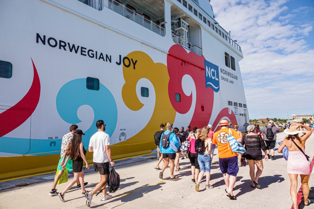 Passengers disembarking the Norwegian Joy cruise ship at Costa Maya, Mexico.