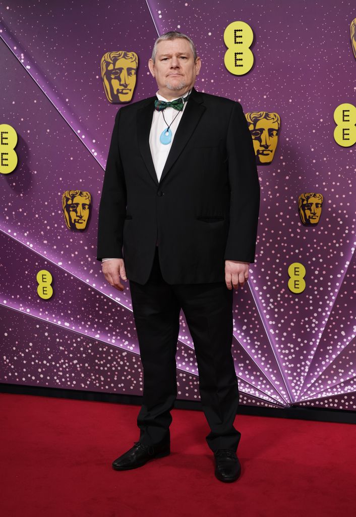 John Davidson attends the 2026 EE BAFTA Film Awards