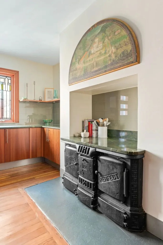 An original range stove remains from the home’s 19th-century origins. Allyson Lubow for Sotheby's International Realty