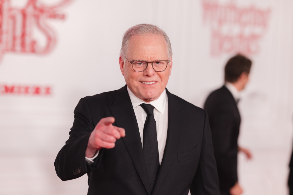 David Zaslav smiling and pointing forward at the "Wuthering Heights" World Premiere.
