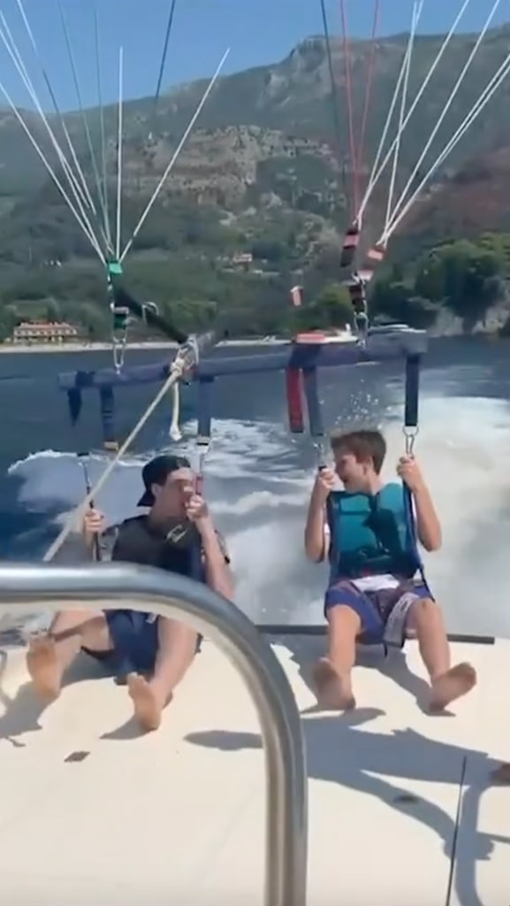 A photo of Brooklyn and Cruz Beckham paragliding