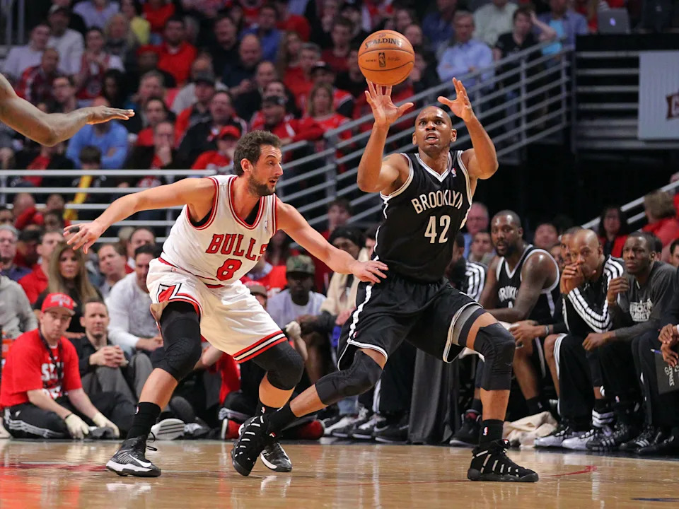 Apr 25, 2013; Chicago, IL, USA; Brooklyn Nets small forward Jerry Stackhouse (42) catches a pass in front of Chicago Bulls shooting guard Marco Belinelli (8) during the second quarter of the first round of the 2013 NBA playoffs at the United Center. Mandatory Credit: Dennis Wierzbicki-USA TODAY Sports