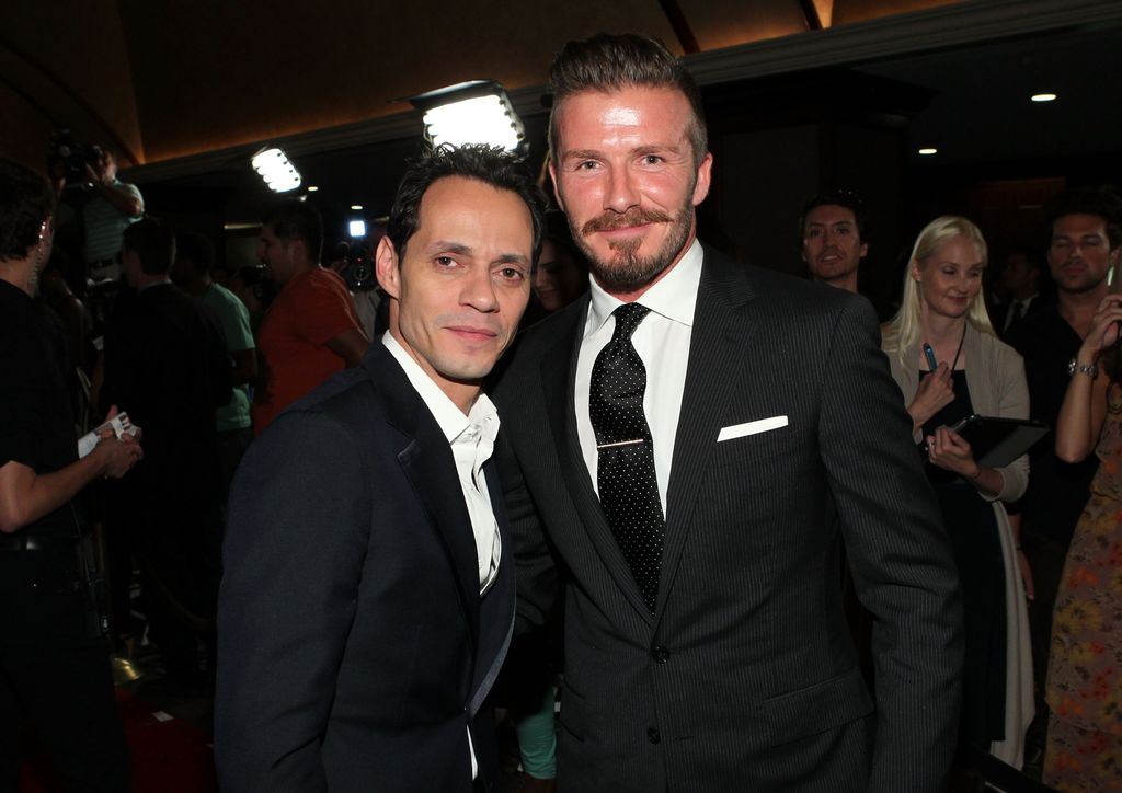 Singer Marc Anthony and professional soccer player David Beckham arrive at the 27th Anniversary Sports Spectacular benefiting Cedars-Sinai Medical Genetics Institute at the Hyatt Regency Century Plaza on May 20, 2012 in Century City, California.  (Photo by Mark Davis/Getty Images for Sports Spectacular)