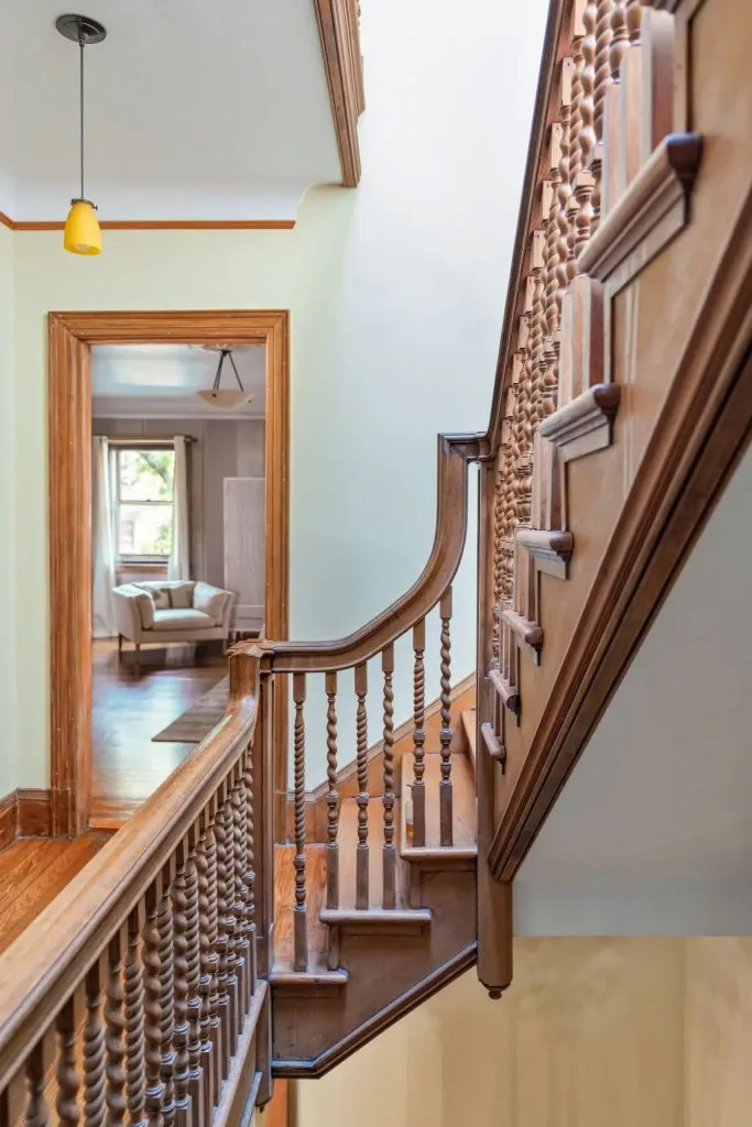 An intricate staircase connects the four stories. Allyson Lubow for Sotheby's International Realty