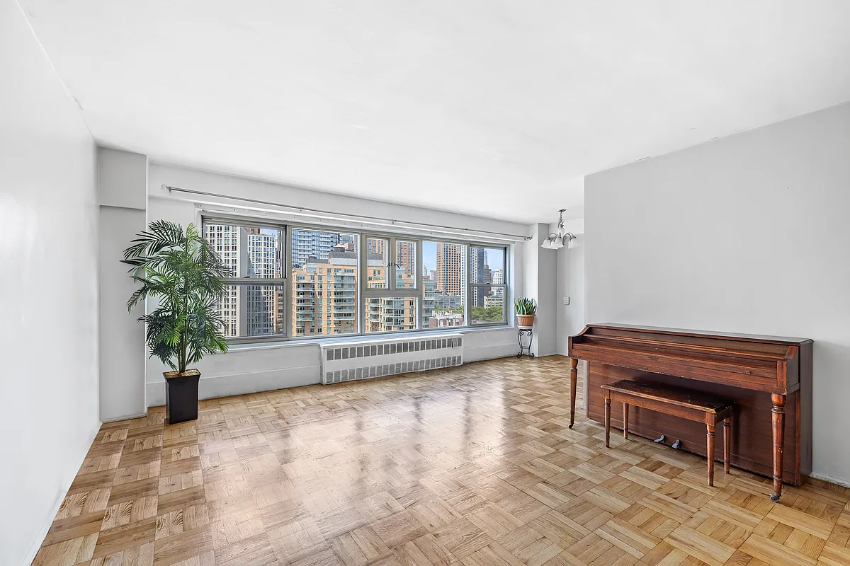 room with wall of windows, wood floor