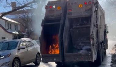Wild video shows NYC garbage truck literally on fire in middle of snow-packed Queens street