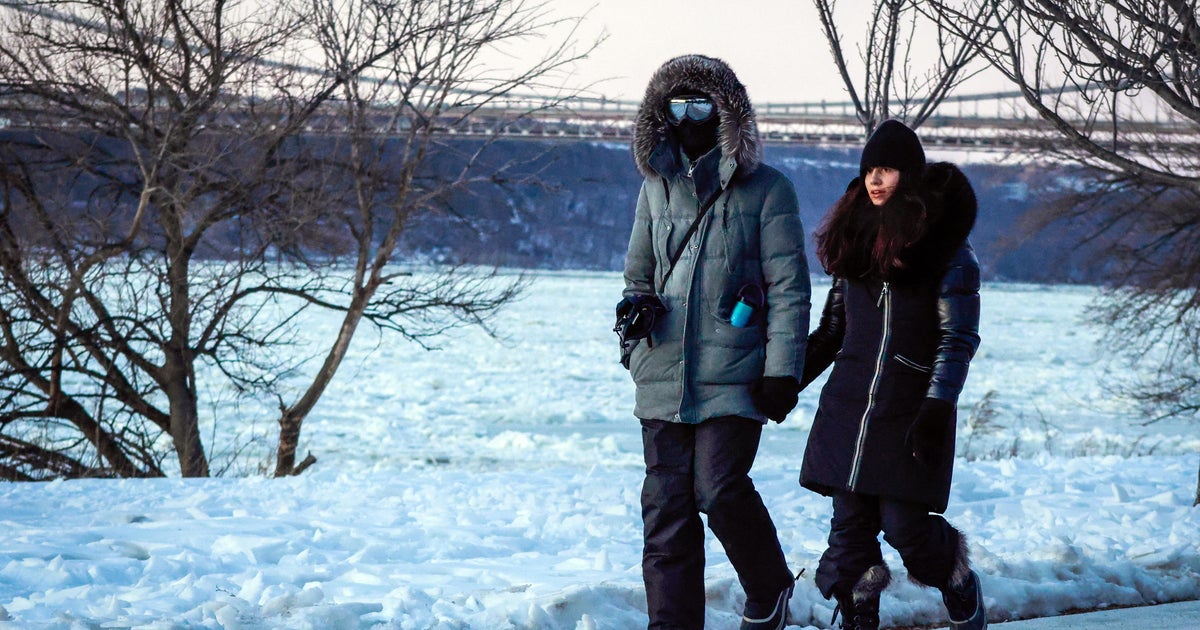 New Yorkers bundle up as officials expand safety efforts amid freezing weather