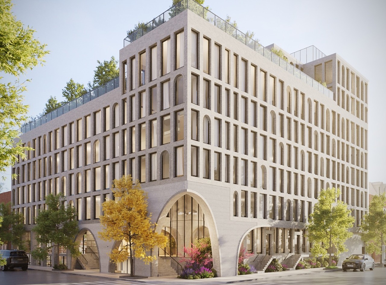 pale building with arched and curved entrances