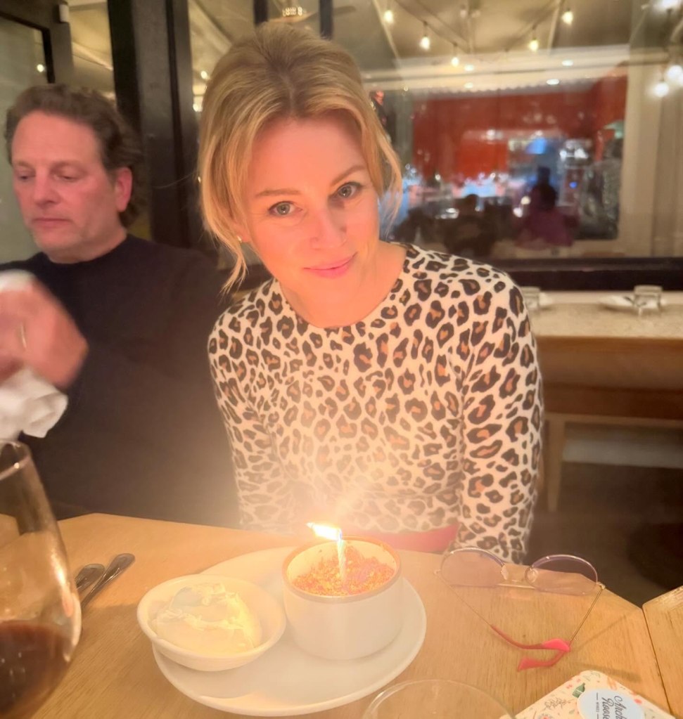 Elizabeth Banks makes a wish on her birthday cake. 