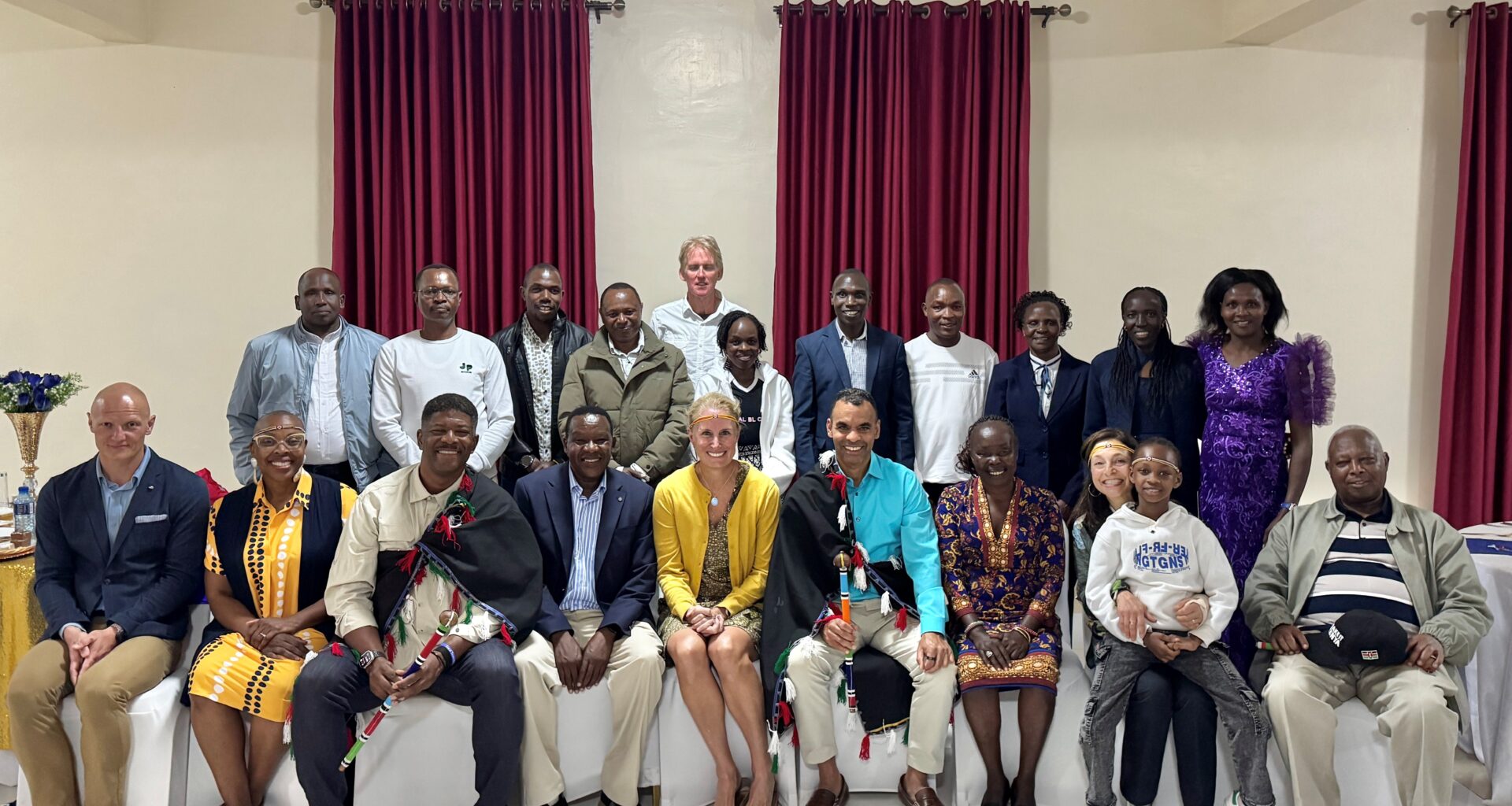 Members of NYRR's Executive Leadership and Professional Athletes Team with Toby Tanser and past Kenyan New York City Marathon champions in February 2026.