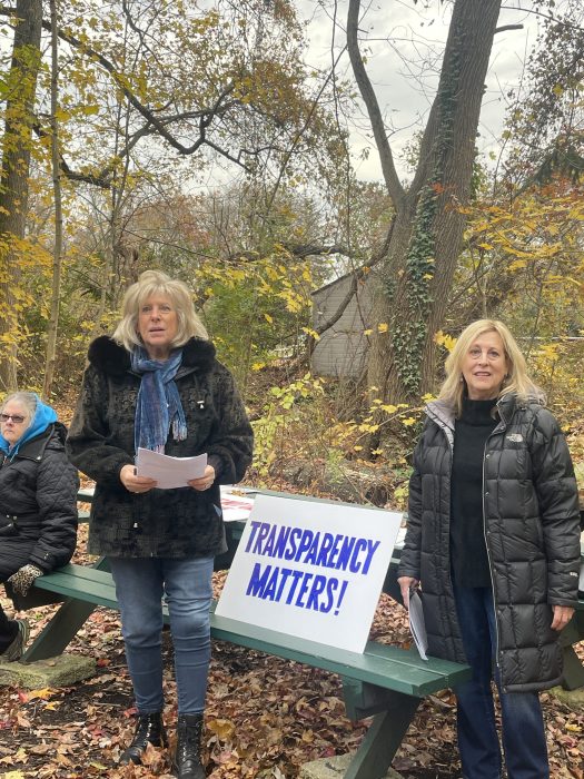 Jody Kass Finkel and Nancy Sherman speaking at a protest in Kings Point Park.
