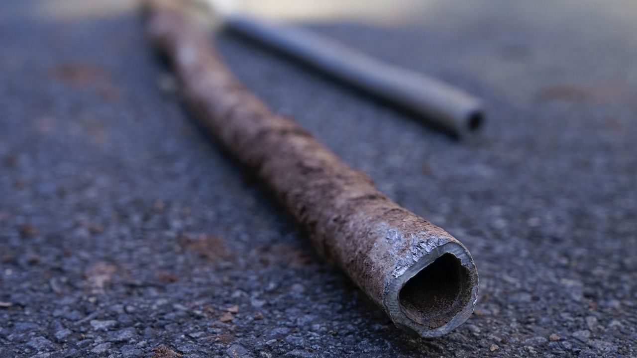 rusty lead pipe